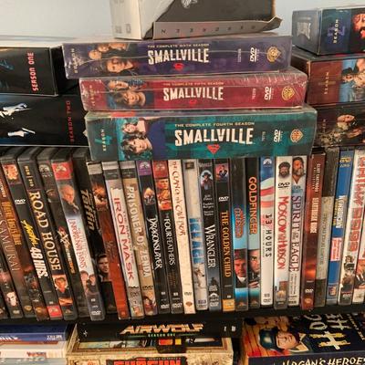 LOT 58: Large Collection of DVD's Including Unopened Box Sets and More