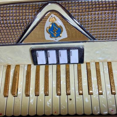LOT 67: Italian Made Accordion with Gold-tone and Mother of Pearl Keys Come in a Case