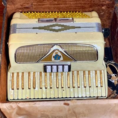 LOT 67: Italian Made Accordion with Gold-tone and Mother of Pearl Keys Come in a Case