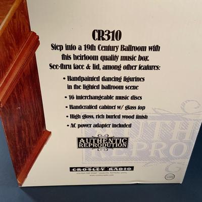 LOT 71: Crosley/ Mr Christmas - 19th Century Ballroom Dancing Music Box with Holiday Classic and Traditional Music Discs. - Never Opened