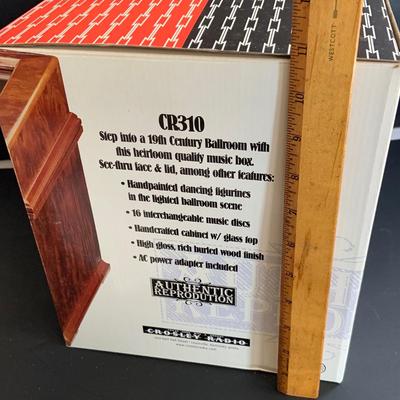 LOT 71: Crosley/ Mr Christmas - 19th Century Ballroom Dancing Music Box with Holiday Classic and Traditional Music Discs. - Never Opened