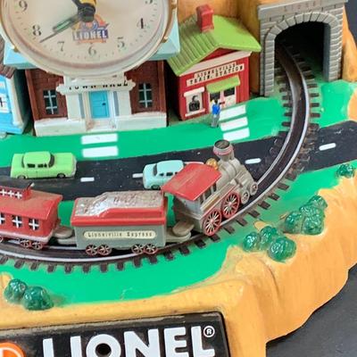 LOT 73: Vintage Lionel Animated Aniversary 100th Clock, Marx Marline Miniture Tin Train Set and More