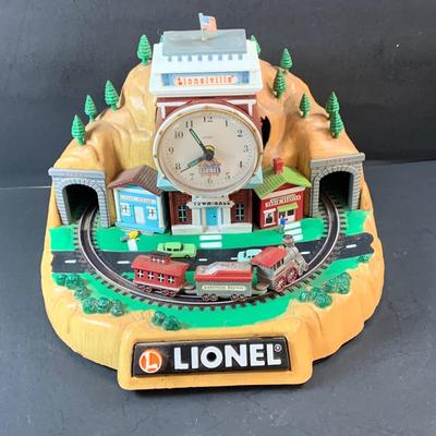 LOT 73: Vintage Lionel Animated Aniversary 100th Clock, Marx Marline Miniture Tin Train Set and More
