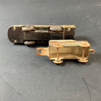 LOT 73: Vintage Lionel Animated Aniversary 100th Clock, Marx Marline Miniture Tin Train Set and More