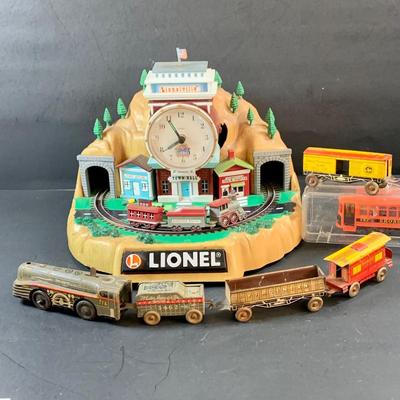 LOT 73: Vintage Lionel Animated Aniversary 100th Clock, Marx Marline Miniture Tin Train Set and More