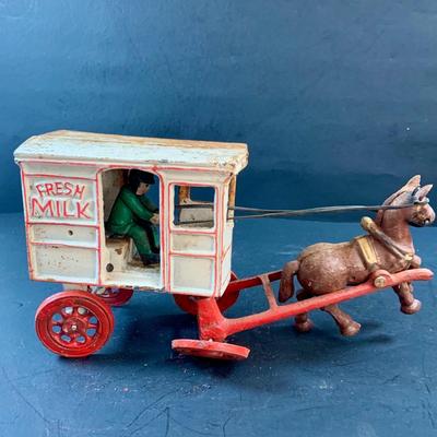 LOT 74: Vintage Cast Iron Horse Drawn Milk Carriage and US Mail Truck