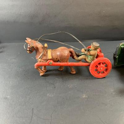 LOT 74: Vintage Cast Iron Horse Drawn Milk Carriage and US Mail Truck