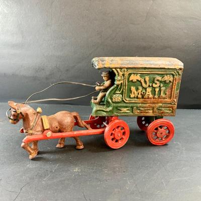 LOT 74: Vintage Cast Iron Horse Drawn Milk Carriage and US Mail Truck