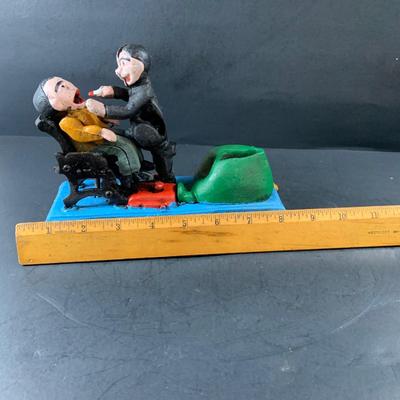 LOT 78: Vintage Cast Iron Dentist and Patient Mechanical Bank
