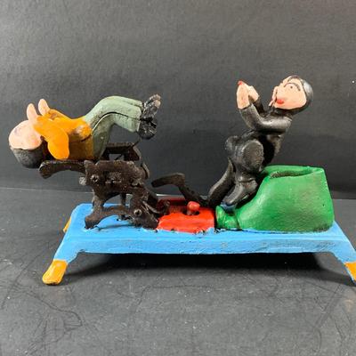 LOT 78: Vintage Cast Iron Dentist and Patient Mechanical Bank