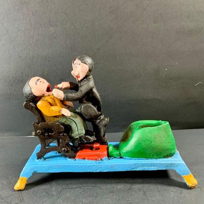 LOT 78: Vintage Cast Iron Dentist and Patient Mechanical Bank