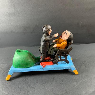 LOT 78: Vintage Cast Iron Dentist and Patient Mechanical Bank