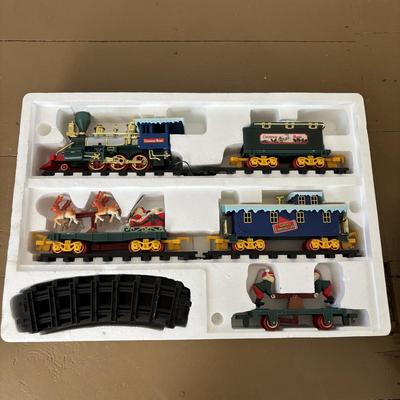 LOT 85: North Pole Toy Shop Animated Christmas Train, Holiday Nutcracker Train Set (unopened) & 3-Wooden Nutcrackers