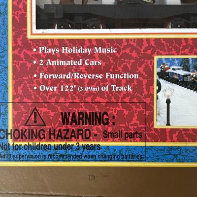 LOT 85: North Pole Toy Shop Animated Christmas Train, Holiday Nutcracker Train Set (unopened) & 3-Wooden Nutcrackers