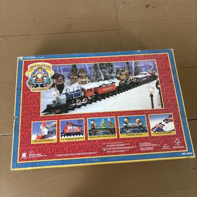 LOT 85: North Pole Toy Shop Animated Christmas Train, Holiday Nutcracker Train Set (unopened) & 3-Wooden Nutcrackers