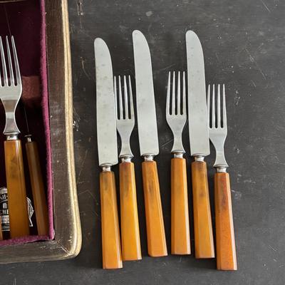 LOT 94: Vintage Butterscotch Bake-lite Flatware Sets