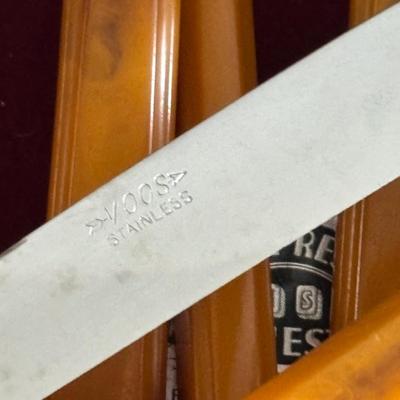 LOT 94: Vintage Butterscotch Bake-lite Flatware Sets