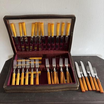 LOT 94: Vintage Butterscotch Bake-lite Flatware Sets