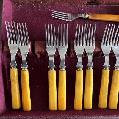 LOT 94: Vintage Butterscotch Bake-lite Flatware Sets