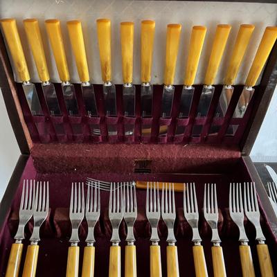 LOT 94: Vintage Butterscotch Bake-lite Flatware Sets