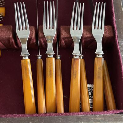 LOT 94: Vintage Butterscotch Bake-lite Flatware Sets