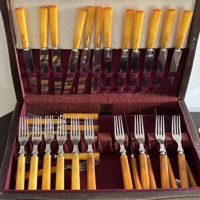 LOT 94: Vintage Butterscotch Bake-lite Flatware Sets