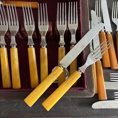 LOT 94: Vintage Butterscotch Bake-lite Flatware Sets