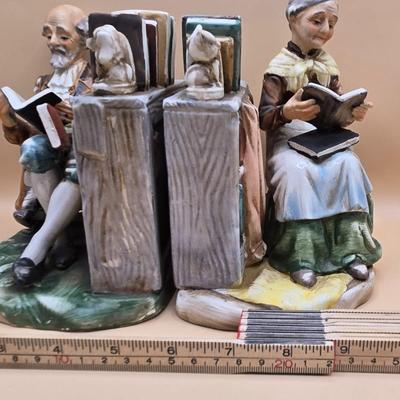 LOT 163: Norleans Japan Elderly Couple Reading Books in Rocking Chairs Bookends, & Instrument Playing Figures