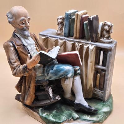 LOT 163: Norleans Japan Elderly Couple Reading Books in Rocking Chairs Bookends, & Instrument Playing Figures