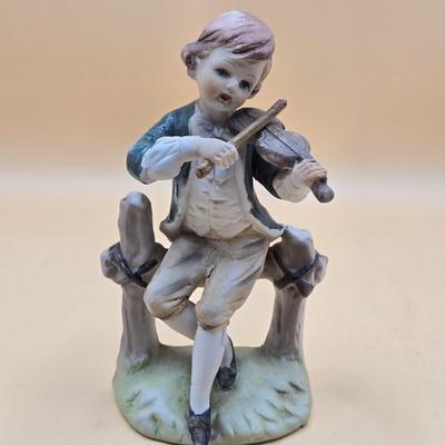 LOT 163: Norleans Japan Elderly Couple Reading Books in Rocking Chairs Bookends, & Instrument Playing Figures