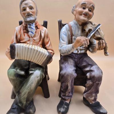 LOT 163: Norleans Japan Elderly Couple Reading Books in Rocking Chairs Bookends, & Instrument Playing Figures
