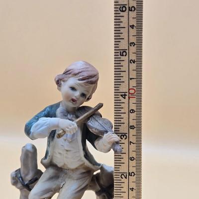 LOT 163: Norleans Japan Elderly Couple Reading Books in Rocking Chairs Bookends, & Instrument Playing Figures