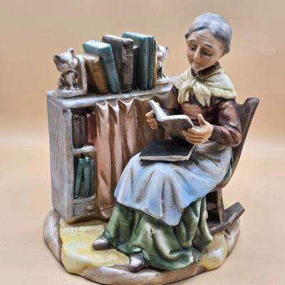 LOT 163: Norleans Japan Elderly Couple Reading Books in Rocking Chairs Bookends, & Instrument Playing Figures