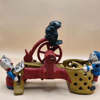 LOT 166: " Professor Pug Frog's Great Bicycle Feat" Cast Iron Mechanical Bank