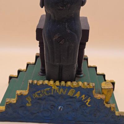 LOT 167: Magician Cast Iron Mechanical Bank