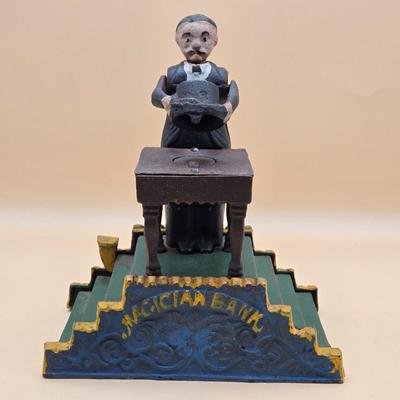 LOT 167: Magician Cast Iron Mechanical Bank