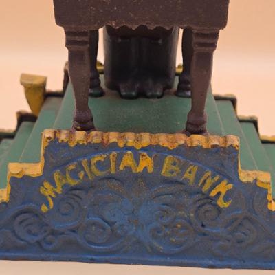 LOT 167: Magician Cast Iron Mechanical Bank