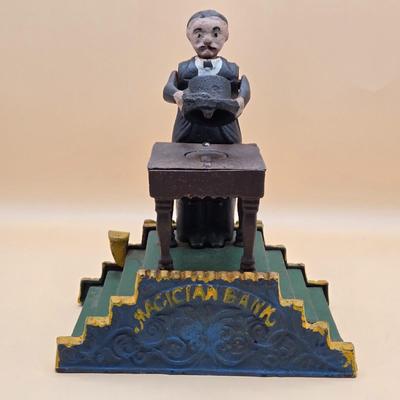 LOT 167: Magician Cast Iron Mechanical Bank