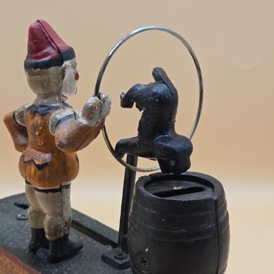 LOT 168: " Trick Dog" Cast Iron Mechanical Bank