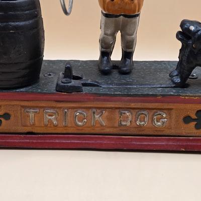 LOT 168: " Trick Dog" Cast Iron Mechanical Bank