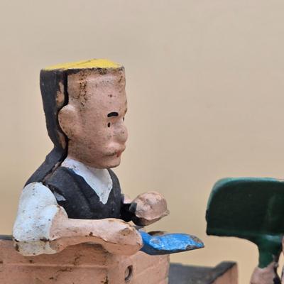 LOT 169: " Mason Bank" Cast Iron Mechanical Bank