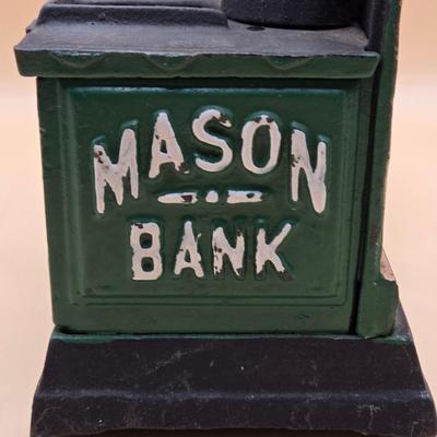 LOT 169: " Mason Bank" Cast Iron Mechanical Bank