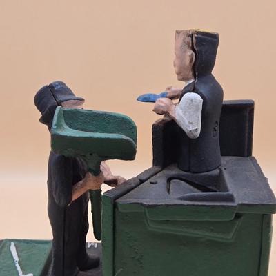 LOT 169: " Mason Bank" Cast Iron Mechanical Bank