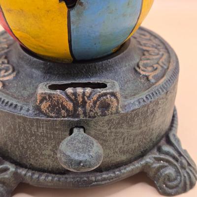 LOT 170: " Spinning Acrobat Clown on Globe" Cast Iron Mechanical Bank