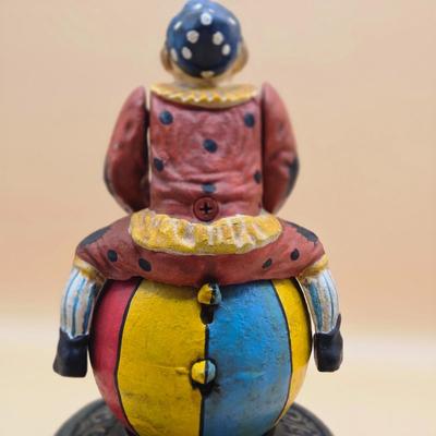 LOT 170: " Spinning Acrobat Clown on Globe" Cast Iron Mechanical Bank