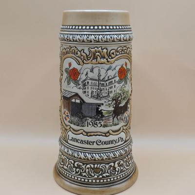 LOT 175: 1984 Olympic Beer Stein, Lancaster Beer Stein, and Collection of Avon Beer Steins