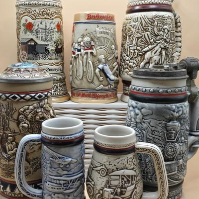 LOT 175: 1984 Olympic Beer Stein, Lancaster Beer Stein, and Collection of Avon Beer Steins