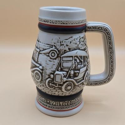 LOT 175: 1984 Olympic Beer Stein, Lancaster Beer Stein, and Collection of Avon Beer Steins