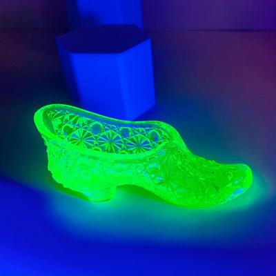 LOT 194: Uranimum Glass Salt and Pepper Shakers, Daisy and Button Vaseline Glass Slipper, Uranium Glass Covered Candy Dish with Painted...