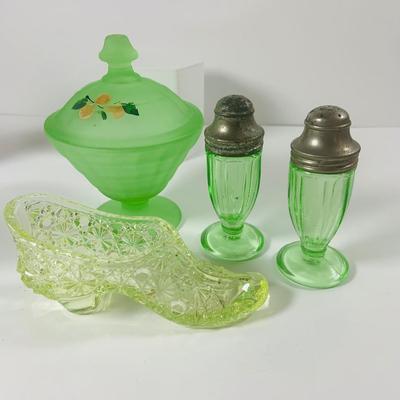 LOT 194: Uranimum Glass Salt and Pepper Shakers, Daisy and Button Vaseline Glass Slipper, Uranium Glass Covered Candy Dish with Painted...